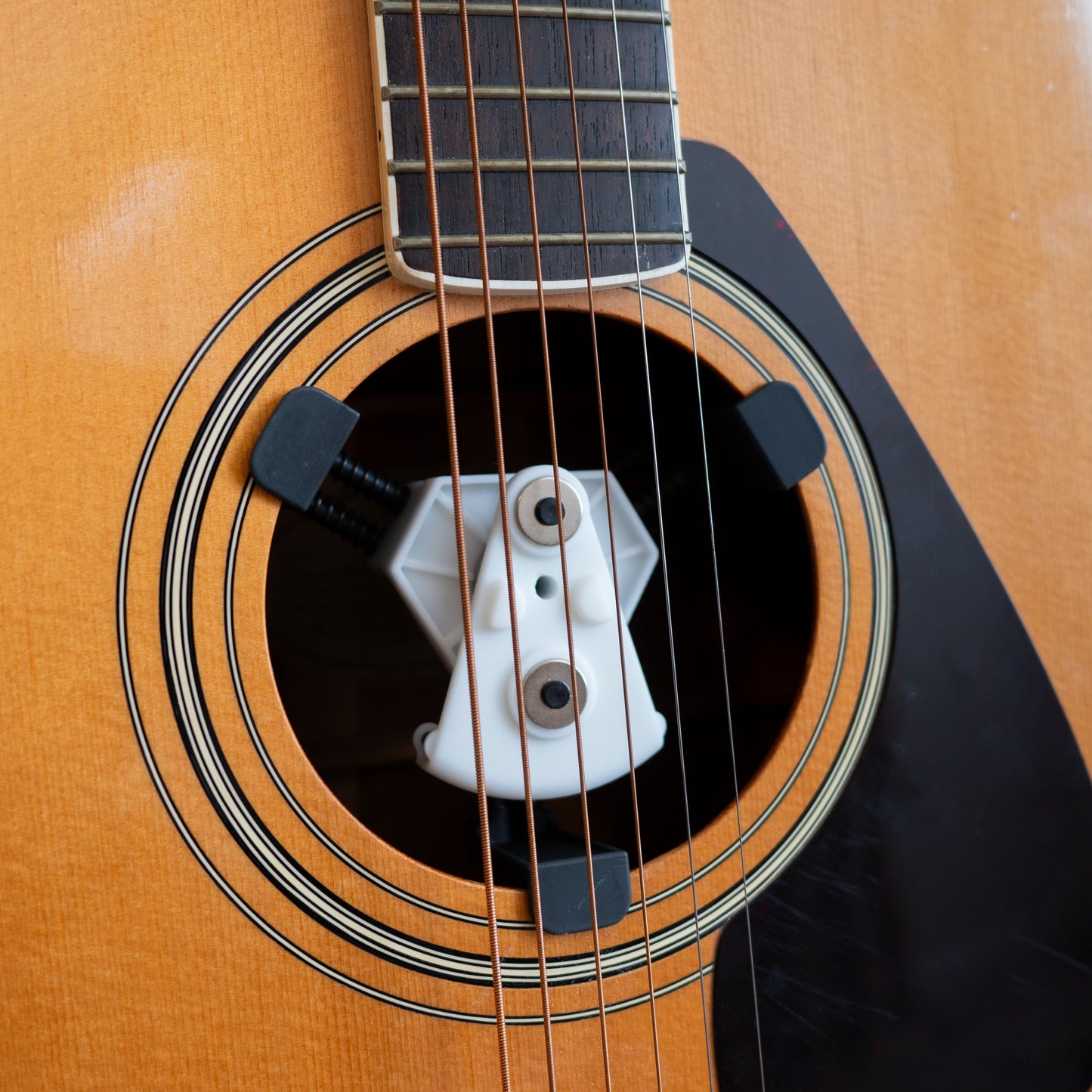 The best acoustic guitar personalization accessory on the market | Level Logos | Level Logos Mount Installed in Sound Hole